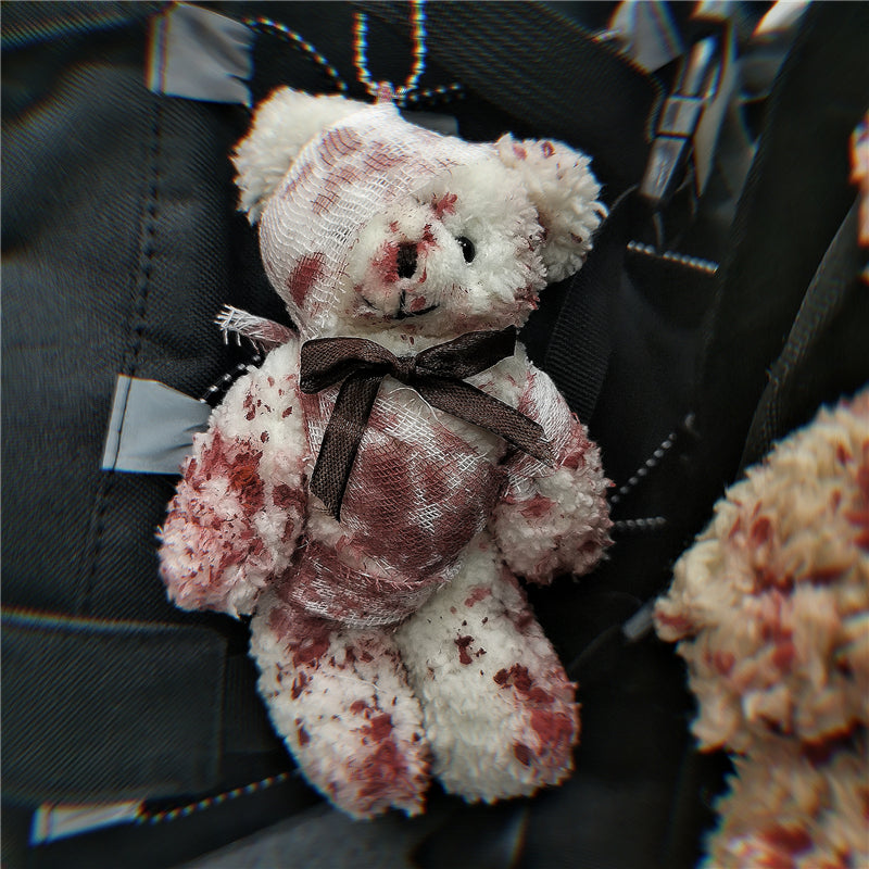 Injured bear pendant KF81359