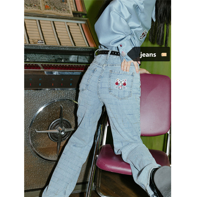 Blue embroidered jeans KF82048